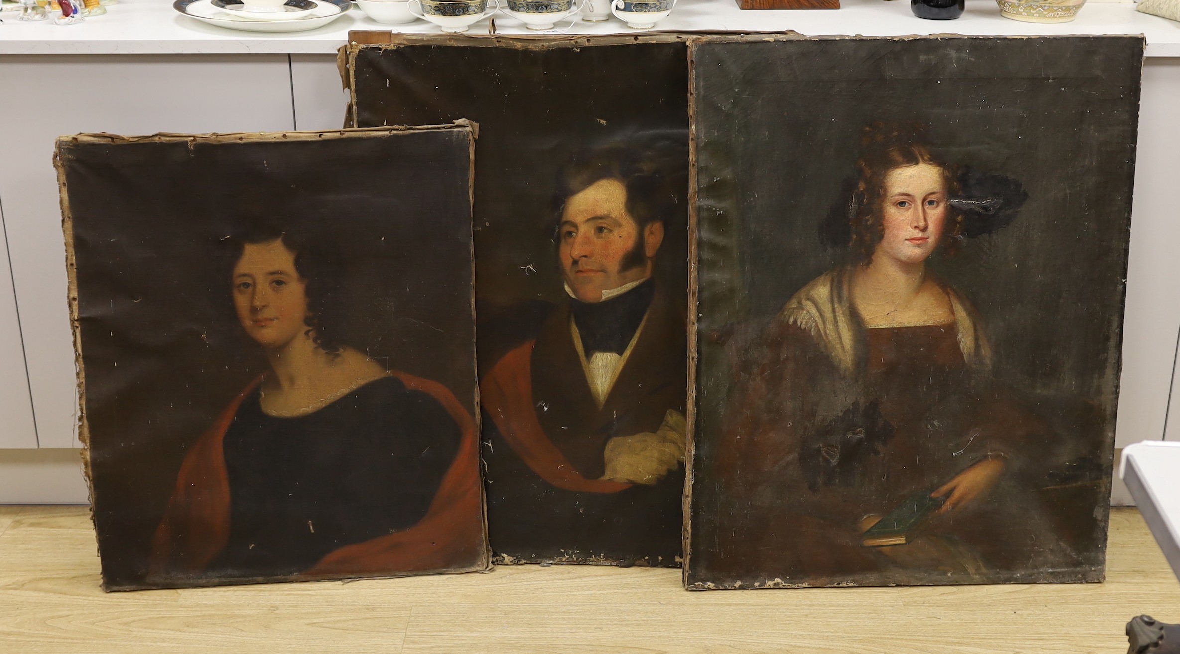 Early 19th century English School, pair of oils on canvas, Portraits of a lady and gentleman of the Leadbeater family, labels verso, 92 x 72cm and a further portrait of Lydia Jane Fisher, née Leadbeater, 76 x 63cm, all u